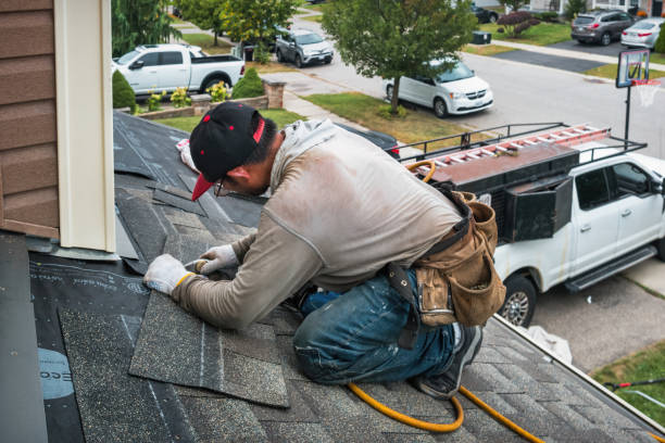 Professional Roof Repair technician working in Tappan, NY